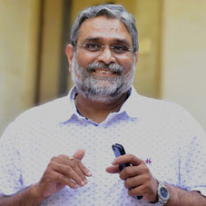  Dr. Dhananjay Rane ,  Director